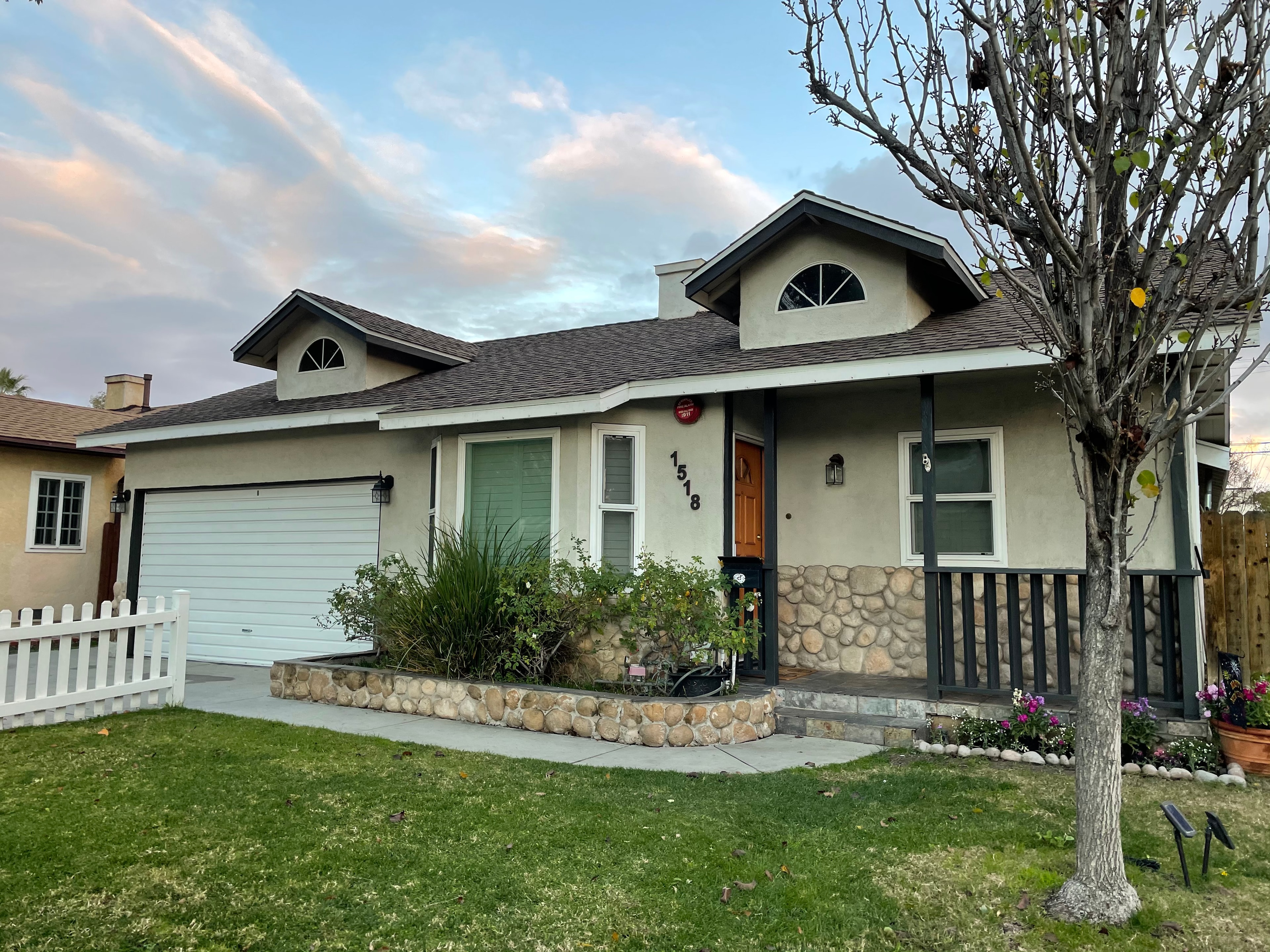 Warm home exterior with beautiful curb appeal