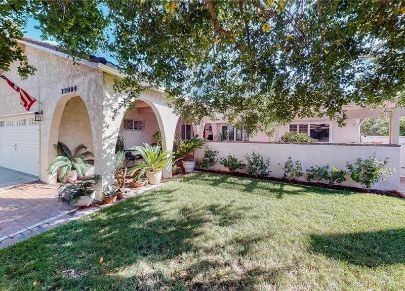 Spanish-style home with arched entryway